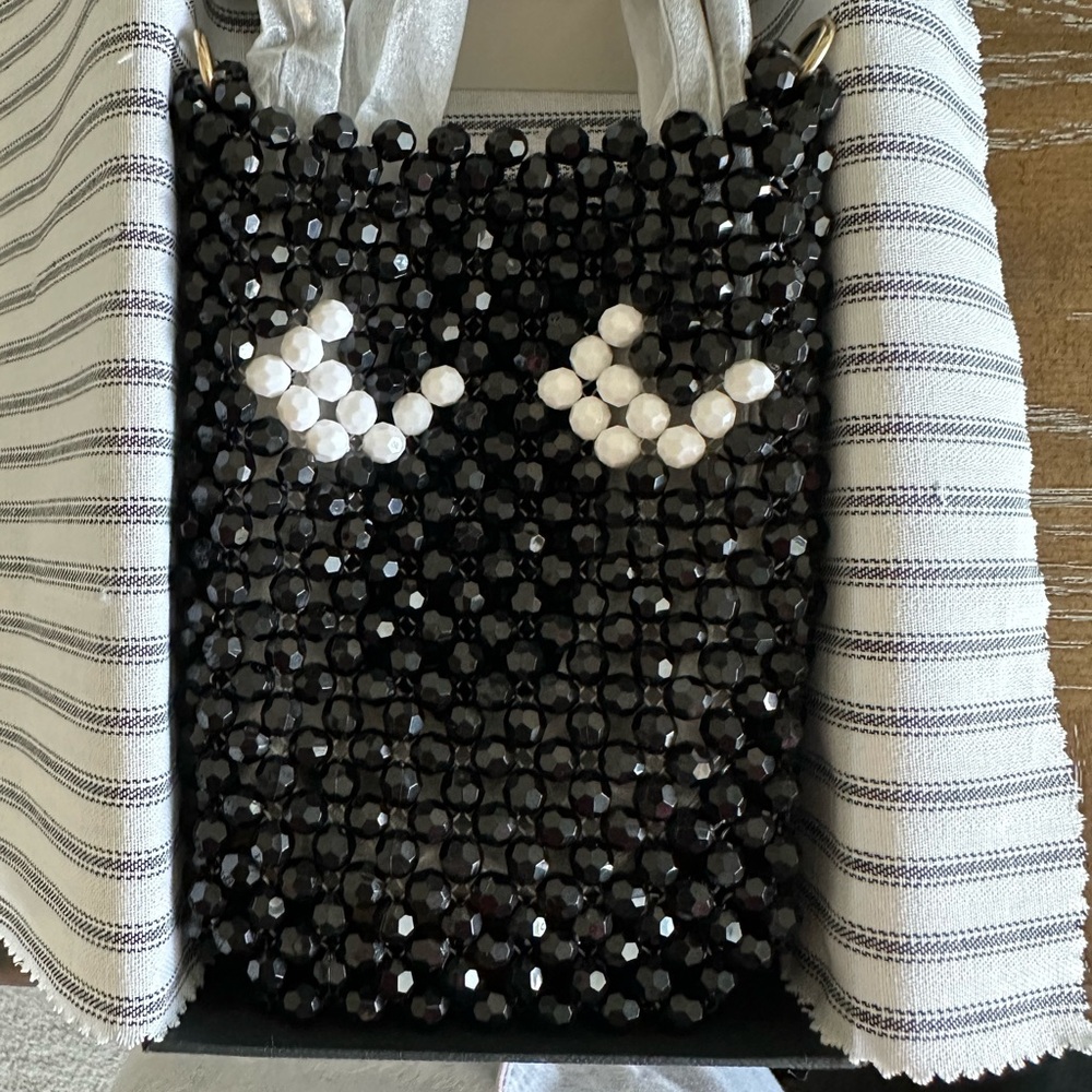 Anya Hindmarch pouch on strap eyes in black resin beads